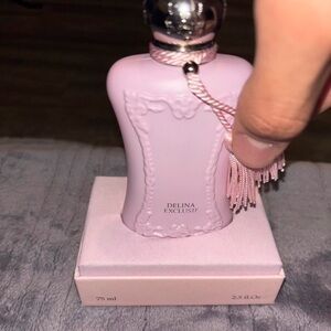 Delina Exclusif 75ml a luxurious, long-lasting fragrance with pink floral notes.